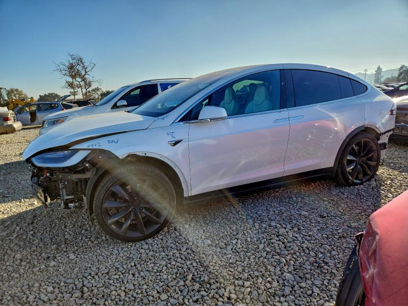 TESLA MODEL X 2019 with VIN 5YJXCBE23KF189582 - Photo from auction