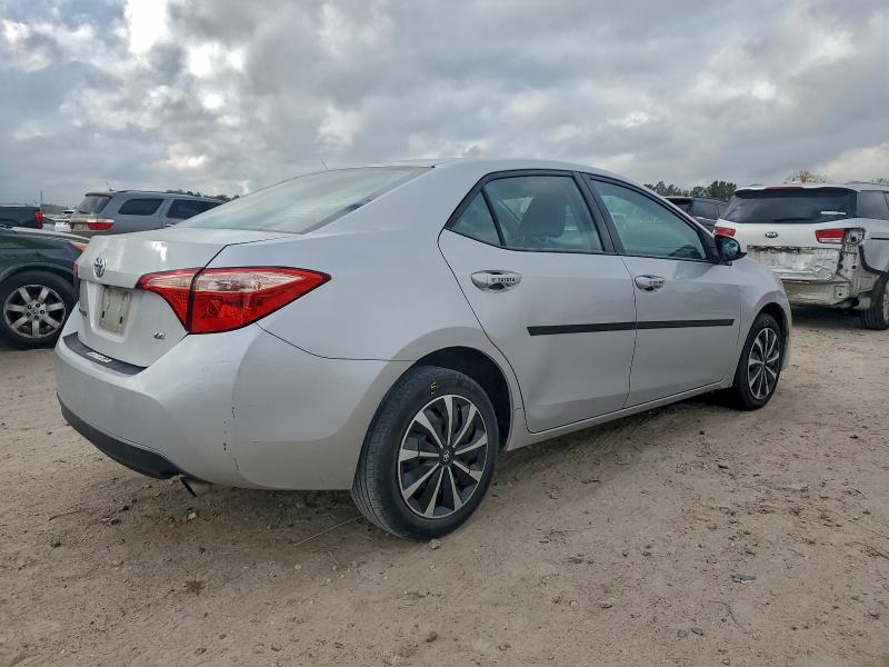 Photo 3 from auction – 2017 TOYOTA COROLLA L with VIN 5YFBURHE7HP695869
