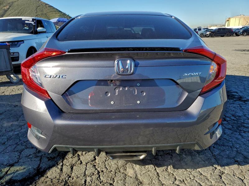 Photo 6 from auction – 2021 HONDA CIVIC with VIN 19XFC2F80ME202473