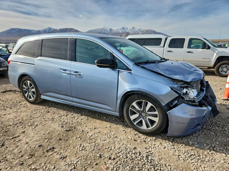 Photo 4 from auction – 2014 HONDA ODYSSEY with VIN 5FNRL5H99EB084956