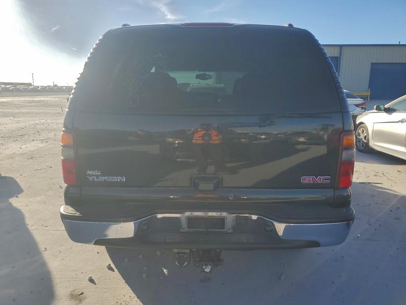 Photo 6 from auction – 2003 GMC YUKON with VIN 1GKEC13ZX3J314173