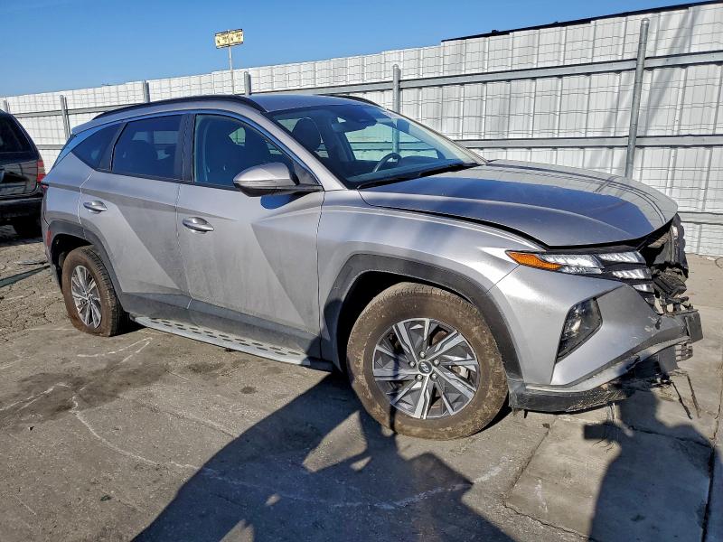 Photo 4 from auction – 2022 HYUNDAI TUCSON BLU with VIN KM8JBCA11NU063434