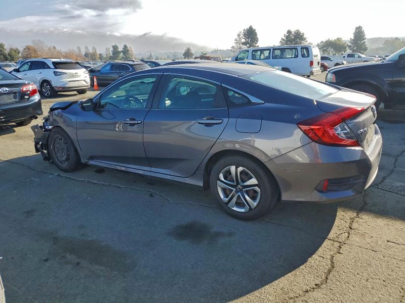 Photo 2 from auction – 2018 HONDA CIVIC LX with VIN 2HGFC2F59JH502293