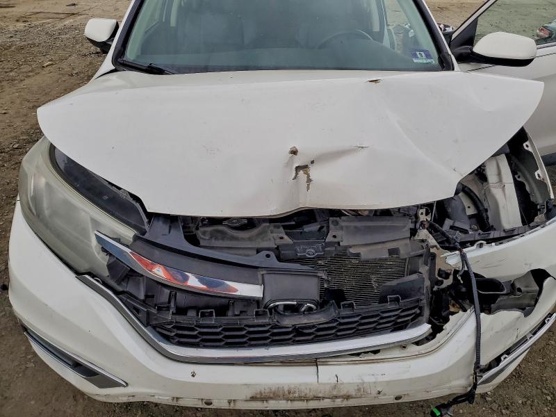 Photo 12 from auction – 2015 HONDA CR-V EXL with VIN 5J6RM4H71FL073934