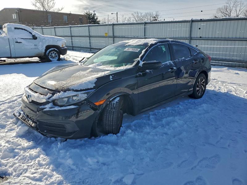 HONDA CIVIC EX 2017 con VIN 19XFC2F74HE206023 - Foto de la subasta