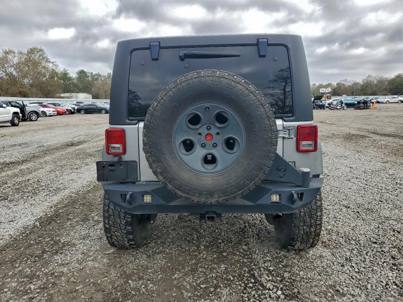 Photo 6 from auction – 2014 JEEP WRANGLER U with VIN 1C4BJWDG8EL135328