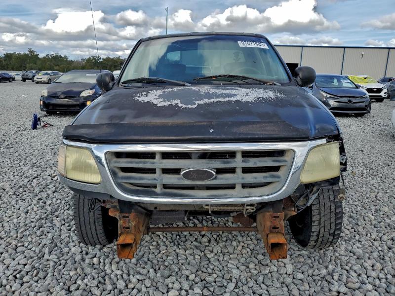 Photo 5 from auction – 2003 FORD F150 SUPER with VIN 1FTRW07673KB21214