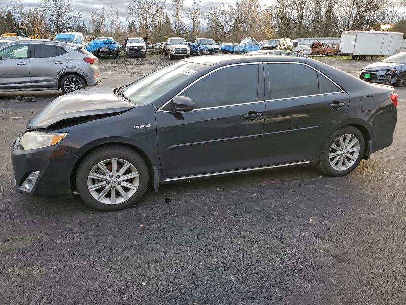 TOYOTA CAMRY HYBR 2012 with VIN 4T1BD1FK0CU038946 - Photo from auction