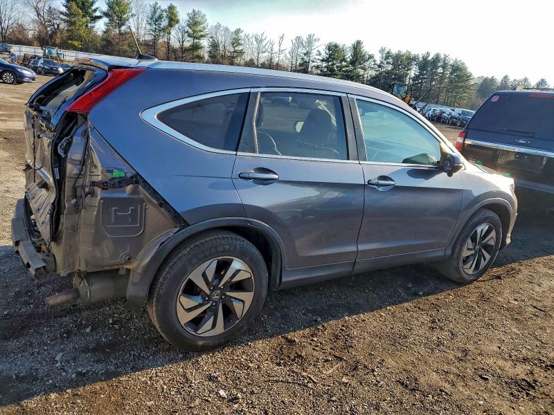 Photo 3 from auction – 2016 HONDA CRV with VIN 5J6RM4H98GL079863