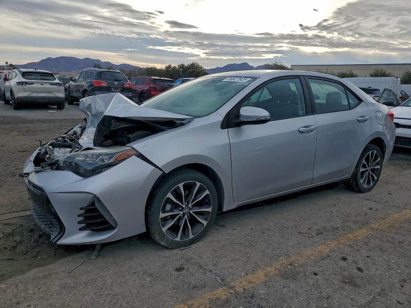 TOYOTA COROLLA L 2017 with VIN 5YFBURHE6HP715691 - Photo from auction