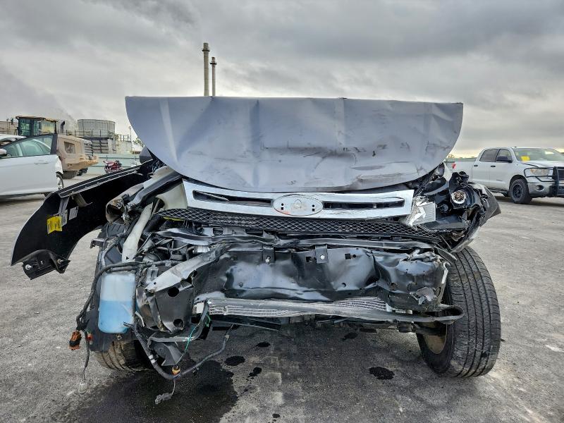 Photo 5 from auction – 2011 FORD FOCUS with VIN 1FAHP3FN1BW165774