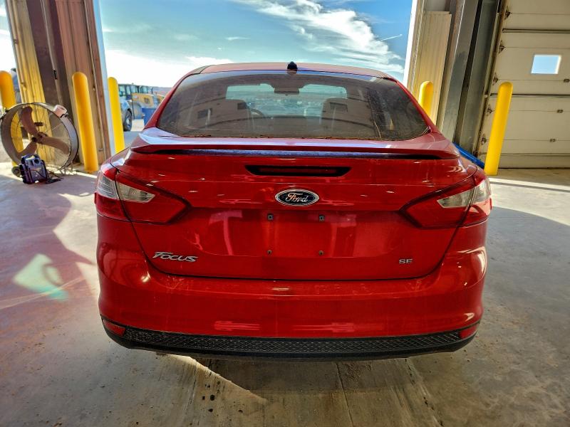 Foto 6 de la subasta – 2013 FORD FOCUS SE con VIN 1FADP3F23DL212134