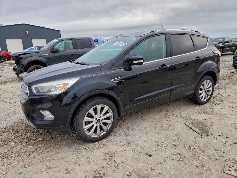 FORD ESCAPE TIT 2017 with VIN 1FMCU9JD7HUD52631 - Photo from auction