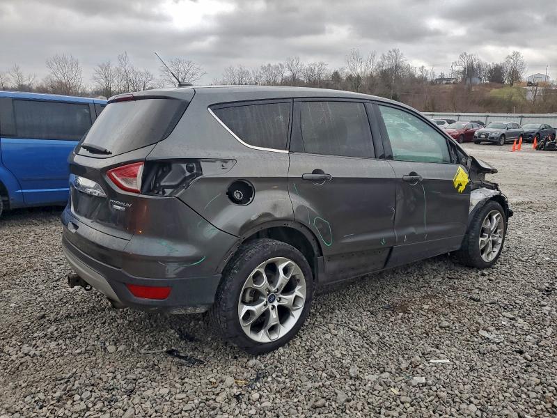 Photo 3 from auction – 2016 FORD ESCAPE TIT with VIN 1FMCU9J91GUA93399