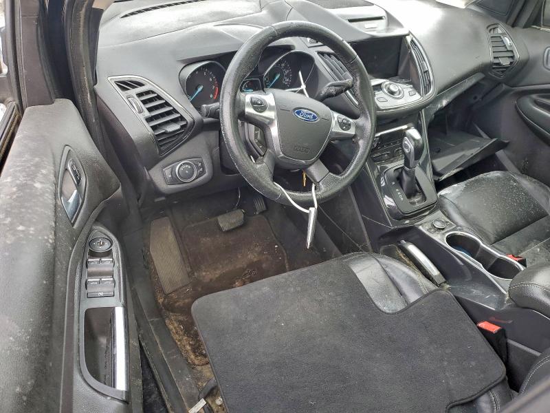 Photo 8 from auction – 2015 FORD ESCAPE with VIN 1FMCU9J94FUC62619