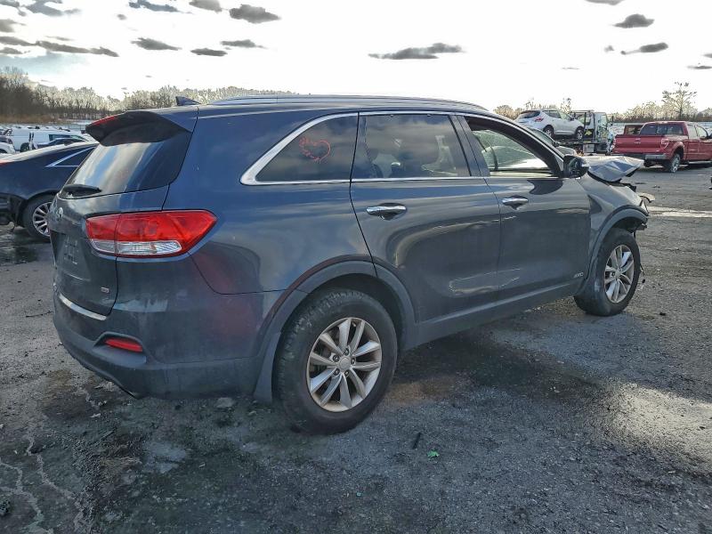 Photo 3 from auction – 2016 KIA SORENTO LX with VIN 5XYPGDA37GG056726