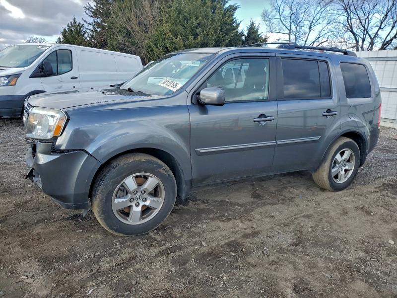 HONDA PILOT EXL 2011 with VIN 5FNYF4H58BB056507 - Photo from auction