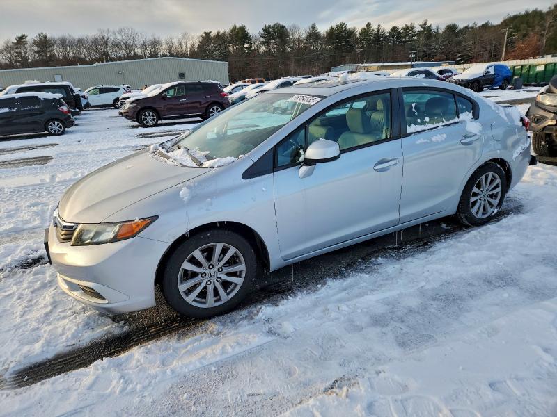 HONDA CIVIC EXL 2012 with VIN 2HGFB2F91CH555921 - Photo from auction
