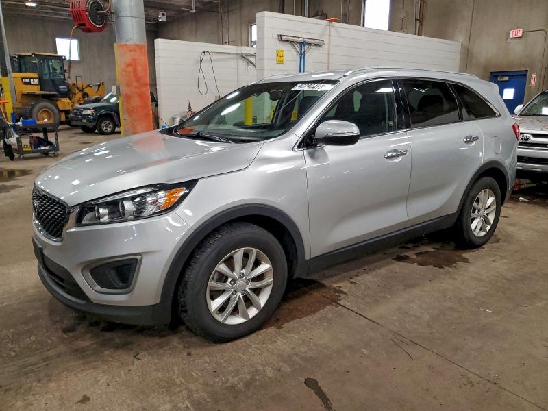 KIA SORENTO LX 2016 with VIN 5XYPG4A38GG092876 - Photo from auction