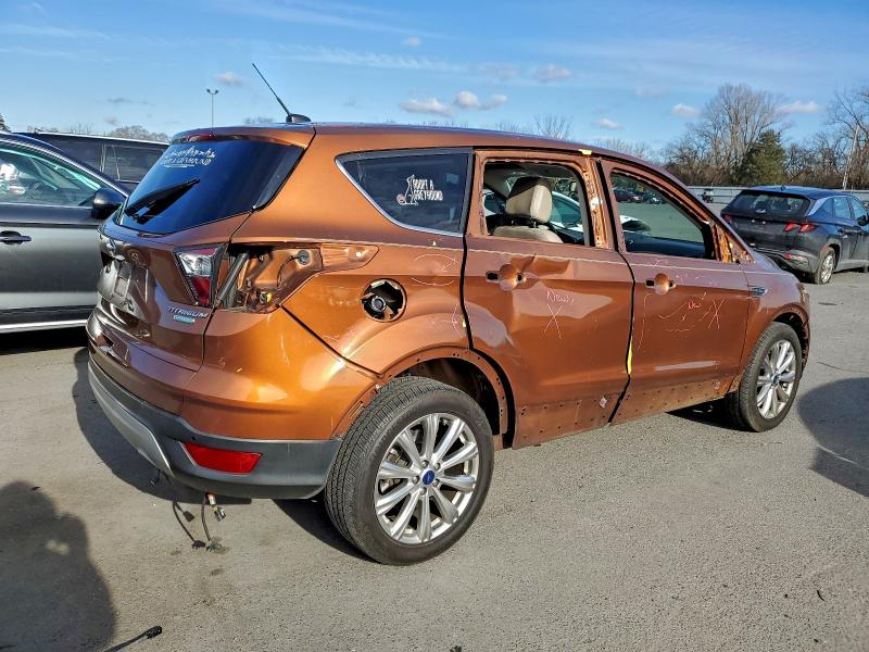 Photo 3 from auction – 2017 FORD ESCAPE TIT with VIN 1FMCU0J91HUA45088