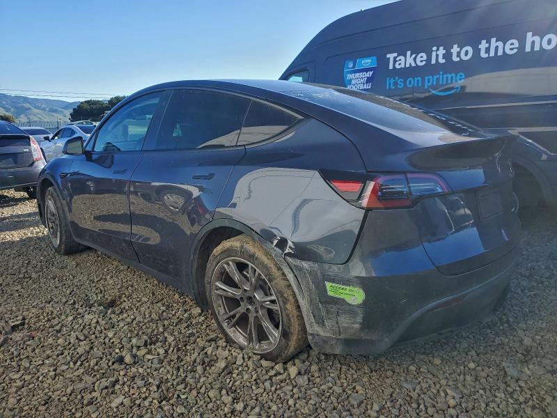 Photo 2 from auction – 2023 TESLA MODEL Y with VIN 7SAYGDEE1PF603211