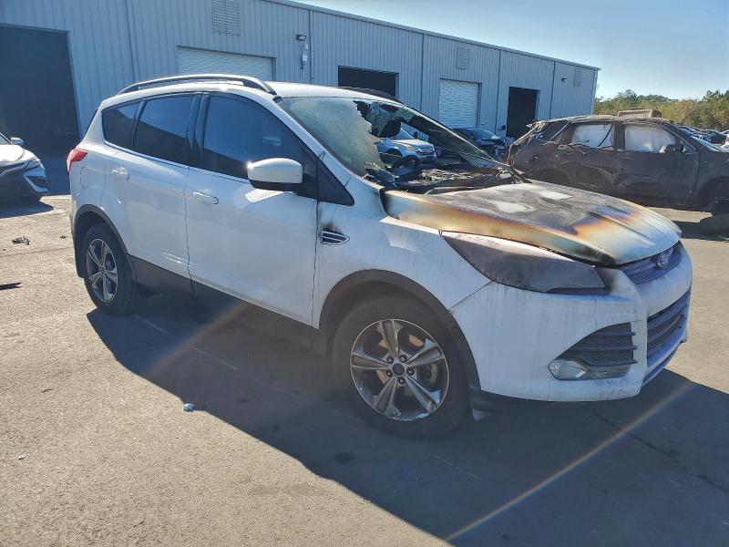 Photo 4 from auction – 2016 FORD ESCAPE SE with VIN 1FMCU0GX5GUB79848