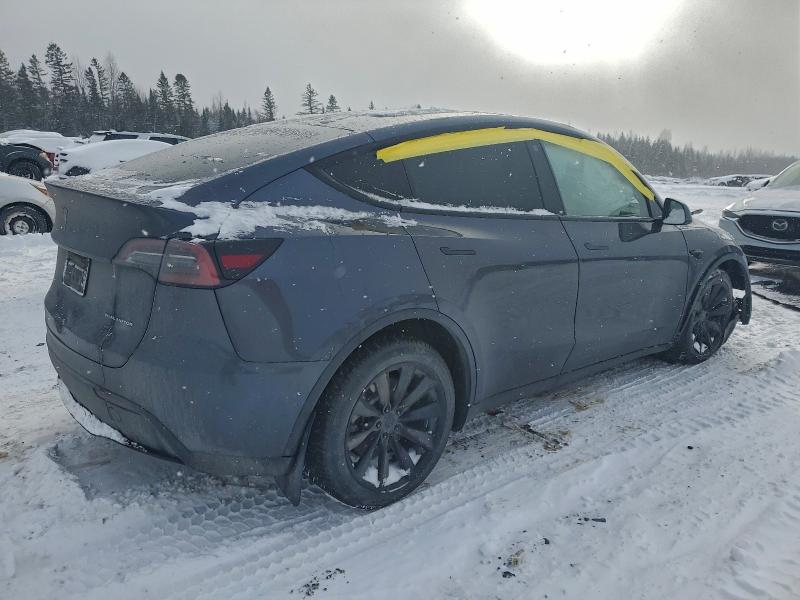 Photo 3 from auction – 2022 TESLA MODEL Y with VIN 7SAYGDEE5NF537209