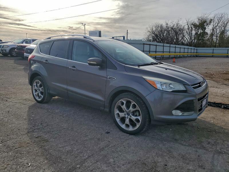 Photo 4 from auction – 2014 FORD ESCAPE TIT with VIN 1FMCU0J9XEUB59568