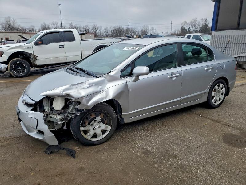HONDA CIVIC LX 2009 with VIN 19XFA16569E044038 - Photo from auction