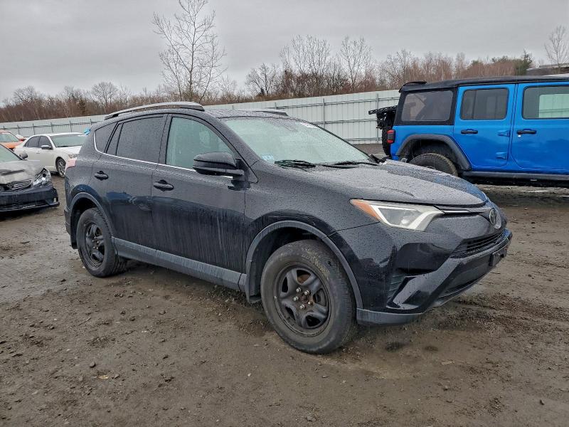 Photo 4 from auction – 2017 TOYOTA RAV4 LE with VIN 2T3BFREV6HW649633