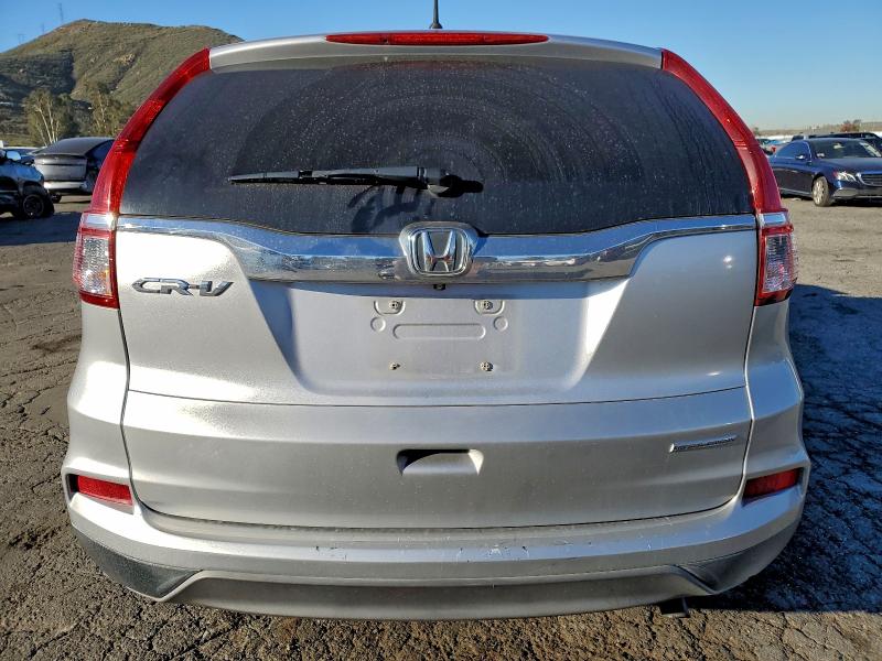 Photo 6 from auction – 2016 HONDA CR-V SE with VIN 2HKRM3H42GH517558