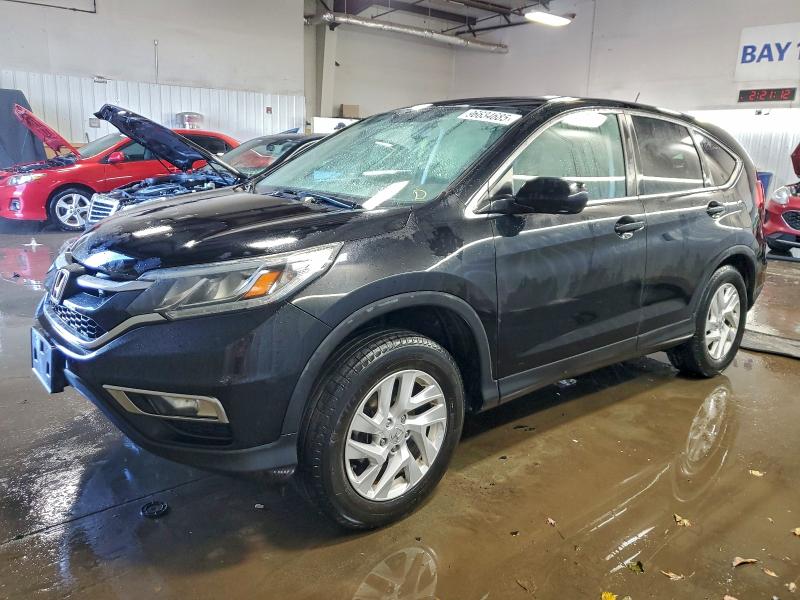 HONDA CR-V EX 2016 with VIN 3CZRM3H5XGG704462 - Photo from auction