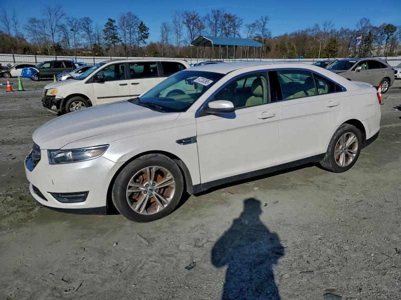 FORD TAURUS SEL 2015 with VIN 1FAHP2E88FG101947 - Photo from auction