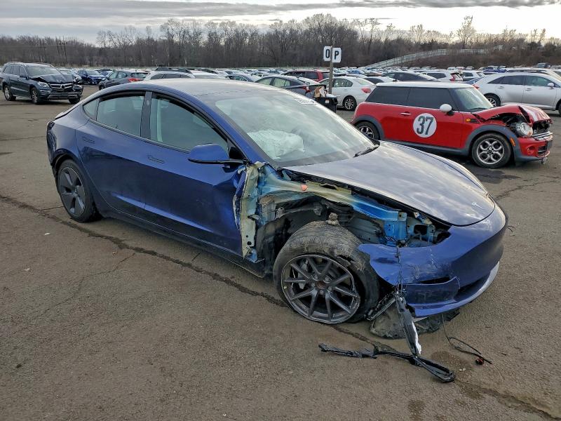 Photo 4 from auction – 2023 TESLA MODEL 3 with VIN 5YJ3E1EA8PF513322