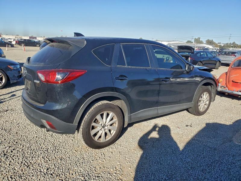 Photo 3 from auction – 2014 MAZDA CX-5 SPORT with VIN JM3KE2BE5E0327720