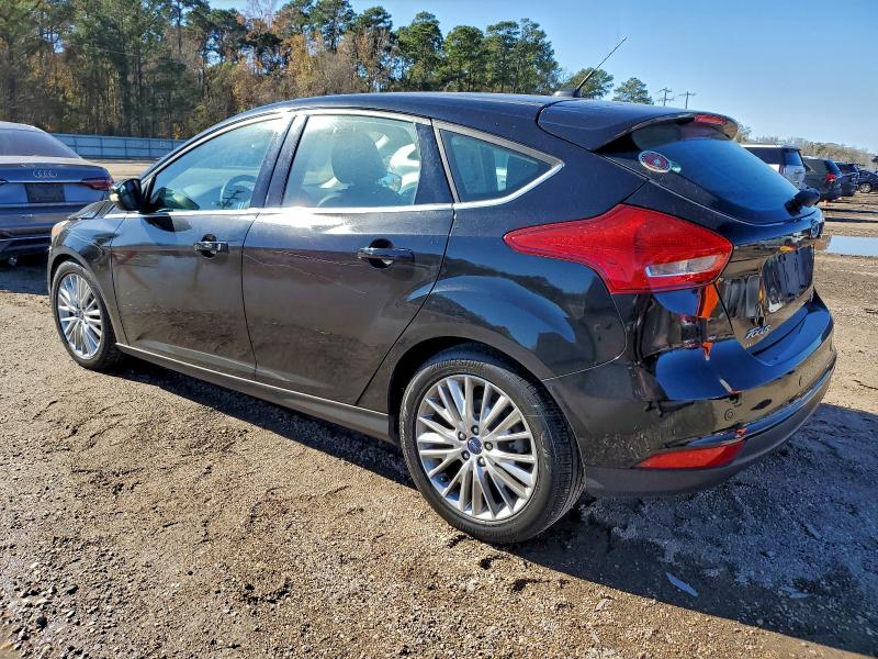 Photo 2 from auction – 2016 FORD FOCUS TITA with VIN 1FADP3N28GL346935