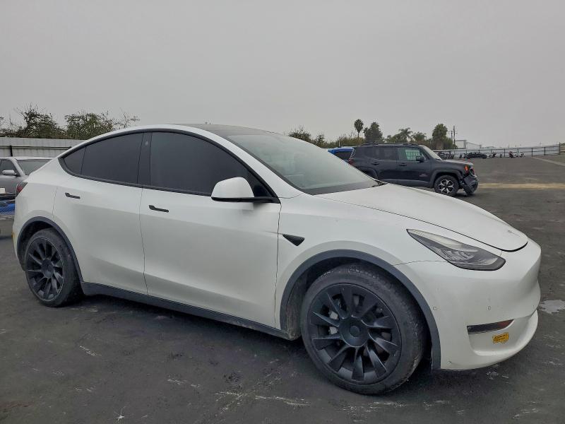 Photo 4 from auction – 2021 TESLA MODEL Y with VIN 5YJYGDED0MF103735
