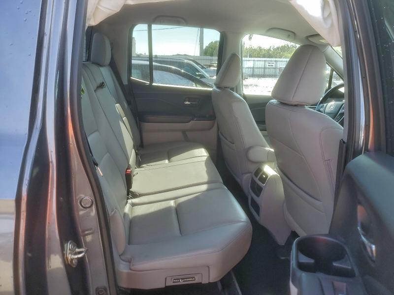 Photo 10 from auction – 2017 HONDA RIDGELINE with VIN 5FPYK3F57HB023037