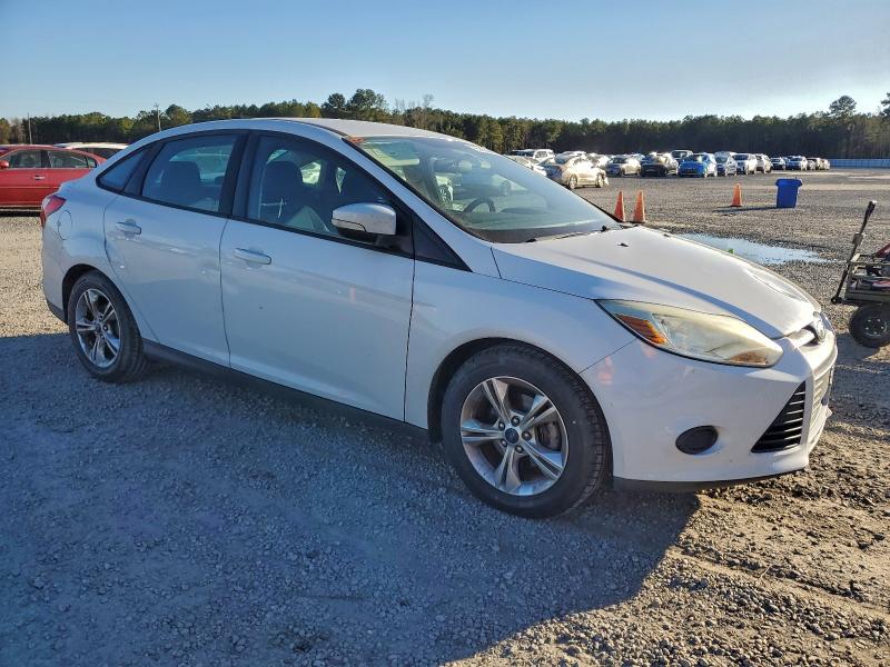 Photo 4 from auction – 2014 FORD FOCUS SE with VIN 1FADP3F29EL159358