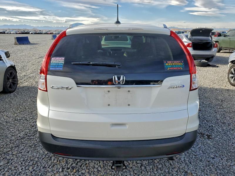 Photo 6 from auction – 2014 HONDA CR-V EXL with VIN 5J6RM4H79EL105320