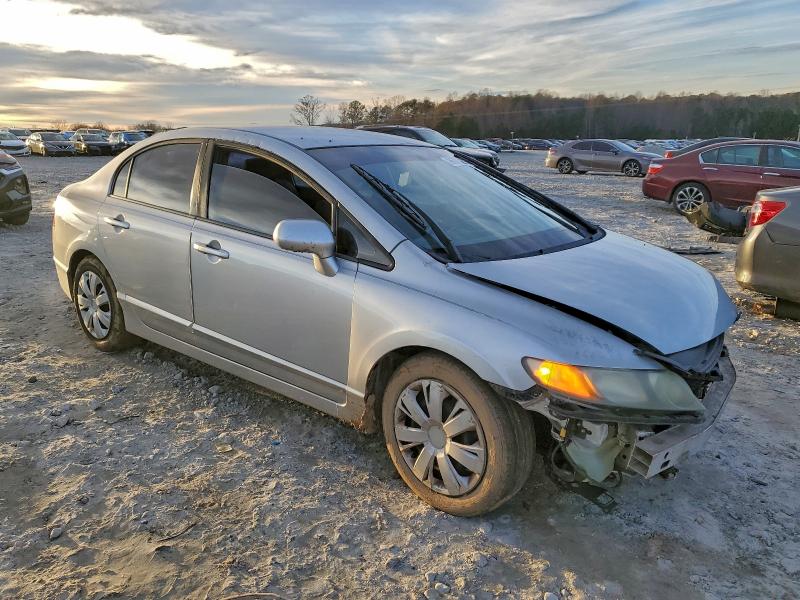 Photo 4 from auction – 2010 HONDA CIVIC LX with VIN 2HGFA1F50AH320952