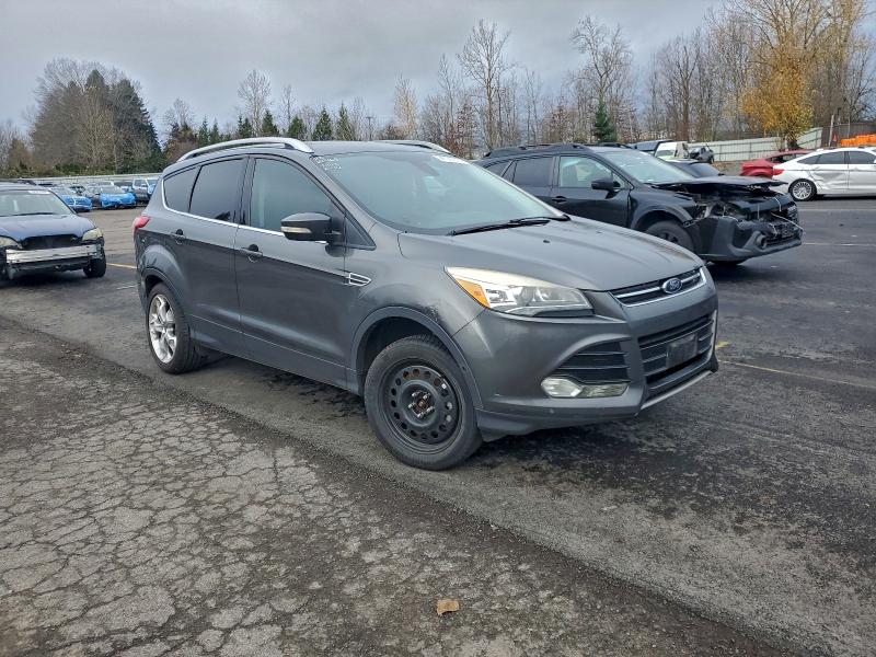 Photo 4 from auction – 2015 FORD ESCAPE TIT with VIN 1FMCU9J94FUB72709