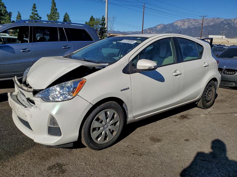 TOYOTA PRIUS C 2014 with VIN JTDKDTB36E1066768 - Photo from auction