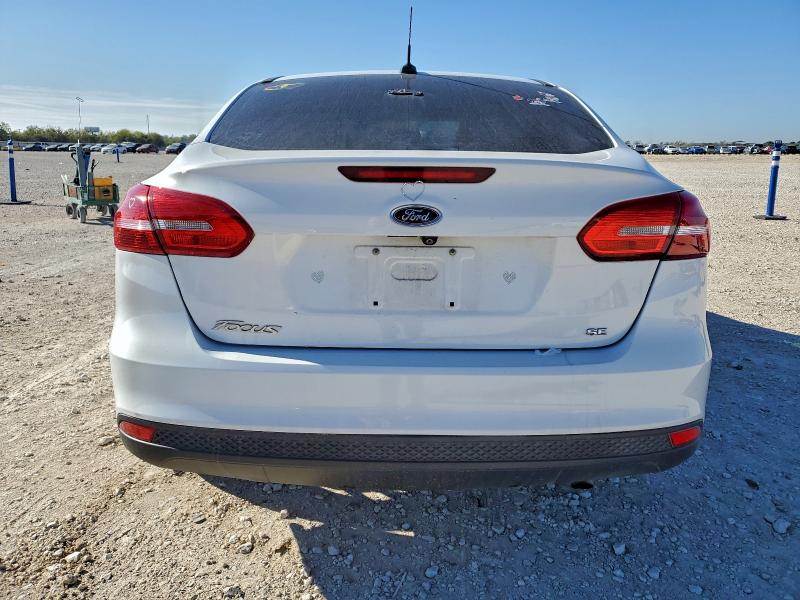 Photo 6 from auction – 2018 FORD FOCUS SE with VIN 1FADP3F2XJL311979