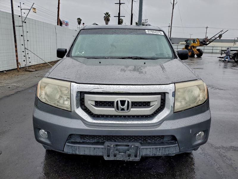 Photo 5 from auction – 2011 HONDA PILOT EXL with VIN 5FNYF3H51BB057573