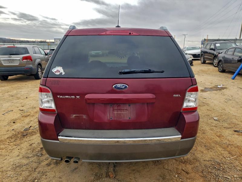 Photo 6 from auction – 2008 FORD TAURUS X with VIN 1FMDK02W98GA41450