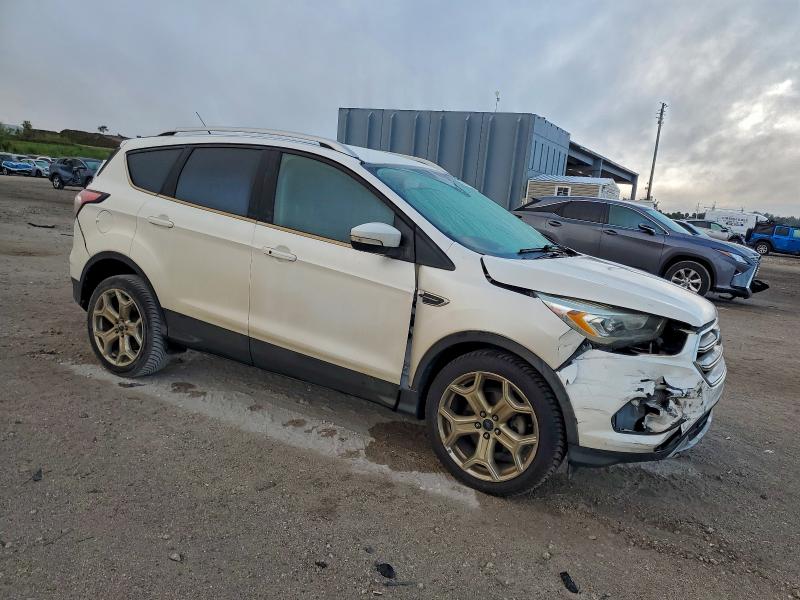 Photo 4 from auction – 2017 FORD ESCAPE TIT with VIN 1FMCU0JD4HUC43779