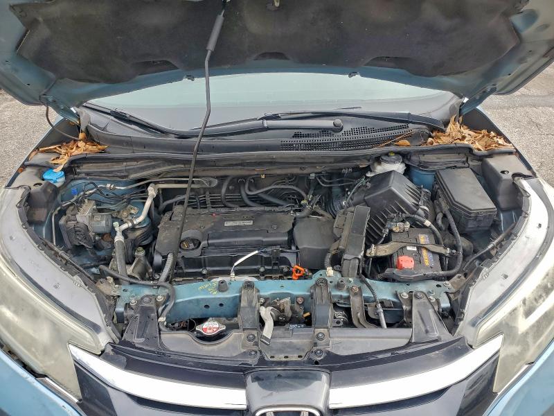 Photo 11 from auction – 2016 HONDA CR-V SE with VIN 2HKRM3H42GH536692
