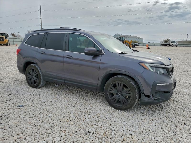 Photo 4 from auction – 2022 HONDA PILOT with VIN 5FNYF5H21NB011778