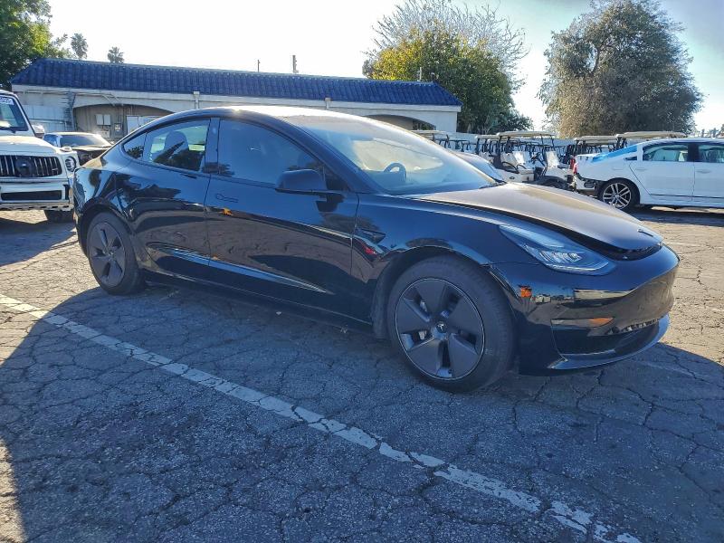 Photo 4 from auction – 2023 TESLA MODEL 3 with VIN 5YJ3E1EAXPF493512